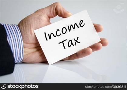 Income tax text concept isolated over white background