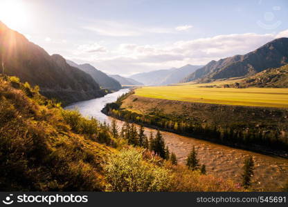 incredible landscape of Altai mountain valley with river at sunset. Altai mountains landscape.. incredible landscape of Altai mountain valley with river at sunset. Altai mountains landscape