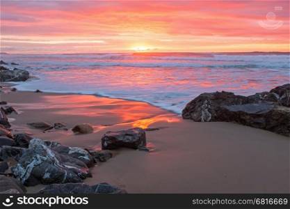 Incredible sunset at the atlantic ocean in Portugal