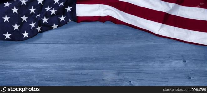 Independence Day holiday concept background with US Flag and blue wooden planks