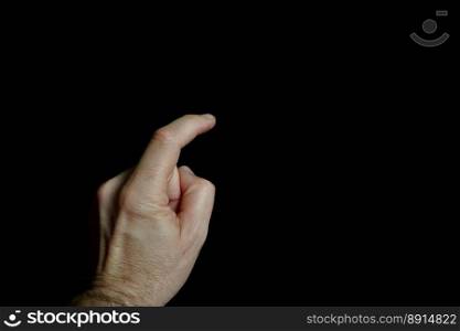                                 index finger pointing at the screen, black background