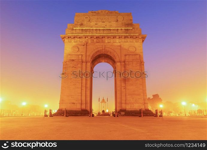 India Gate in yellow evening lights, New Dehli.. India Gate in yellow evening lights, New Dehli