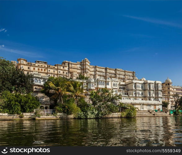 India luxury tourism concept background - Udaipur City Palace from Lake Pichola. Udaipur, Rajasthan, India