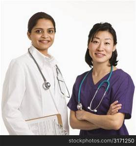 Indian and Asian mid adult woman doctors portrait on white background.