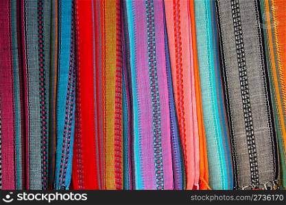 Indian colorful scarf in a row scarves vivid colors stripes
