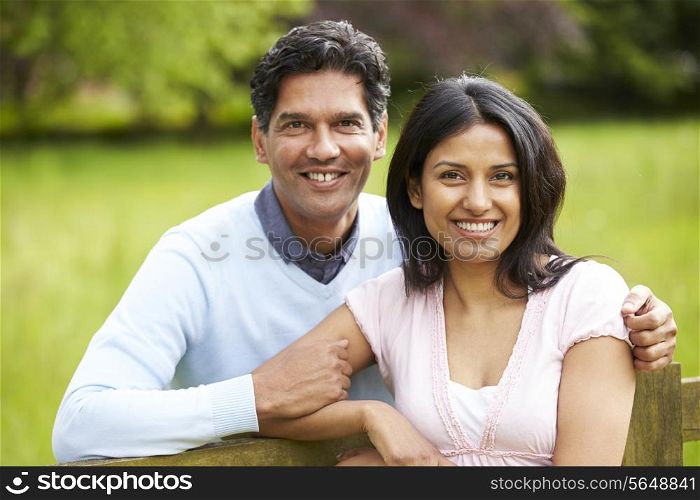 Indian Couple Walking In Countryside