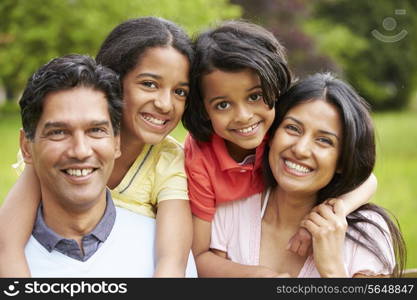 Indian Family Walking In Countryside