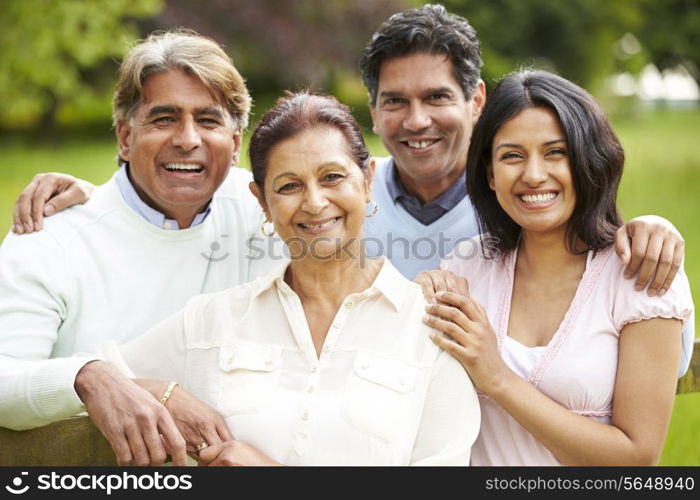 Indian Family Walking In Countryside