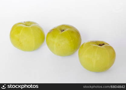 Indian gooseberries on white background