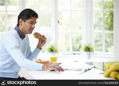 Indian Man Enjoying Breakfast At Home