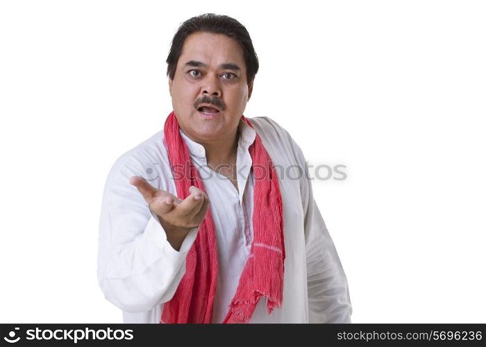 Indian mature politician gesturing over white background
