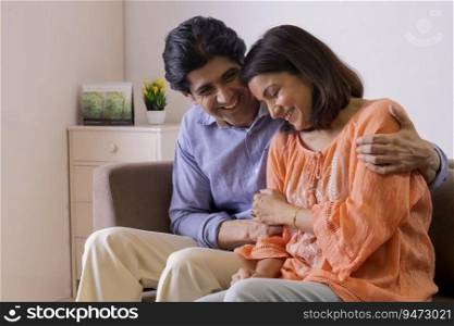 Indian middle age couple spending good time at home