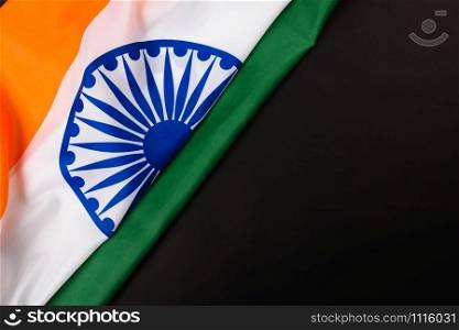 Indian republic day, flat lay top view, Indian flag on black background with copy space for your text