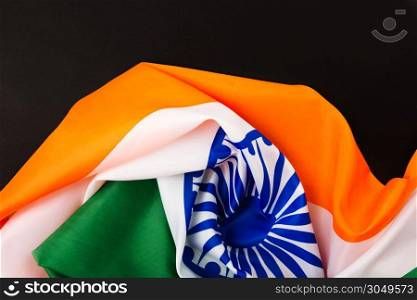 Indian republic day, flat lay top view, Indian flag on black background with copy space for your text