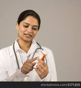 Indian woman doctor explaining medication.