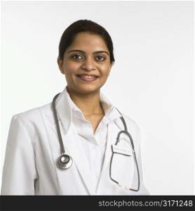 Indian woman doctor head and shoulder portrait on white background.