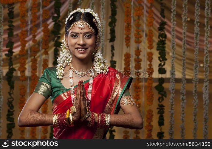 Indian woman greeting Namaste