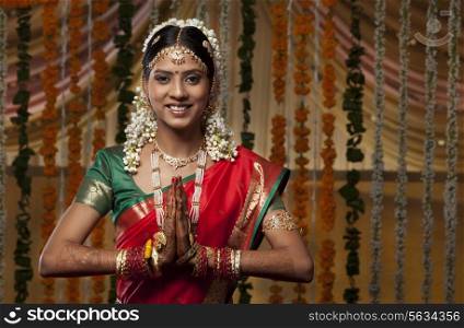Indian woman greeting Namaste