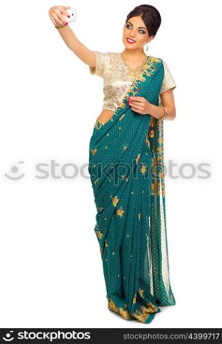 Indian woman with mobile phone isolated on white