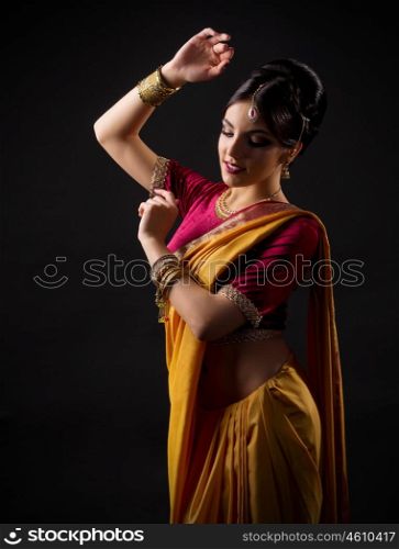 Indian young woman on black