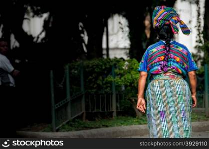 Indigenous woman in Guatemala. An Indigene Woman walking thorugh Antigua in Guatemala