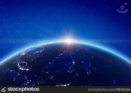 Indonesia city lights sunrise. Elements of this image furnished by NASA. 3d rendering. Indonesia city lights sunrise