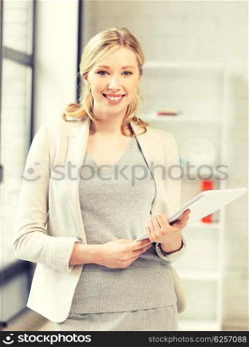 indoor picture of happy woman with documents. happy woman with documents