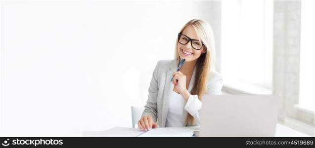 indoor picture of smiling woman with documents and pen. businesswoman with documents