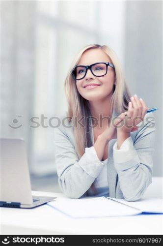 indoor picture of smiling woman with notebook and pen. businesswoman on a meeting