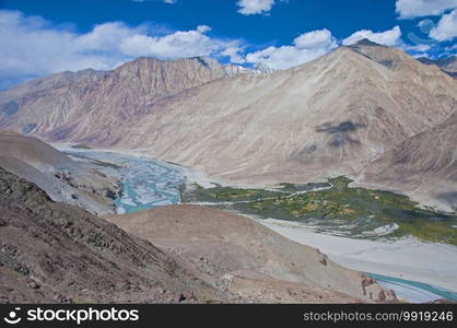 Indus river flowing through mountains at Leh outskirts, Ladakh, India