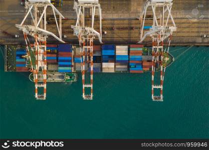industrial business international sea freight station by large cargo containers ship above view frome drone camera in Thailand