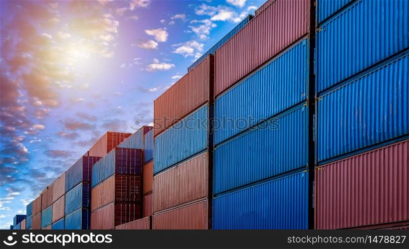 Industrial container yard for business commercial trade logistic transportation oversea worldwide Import Export, Stack of colorful cargo freight ship container at sunset background.