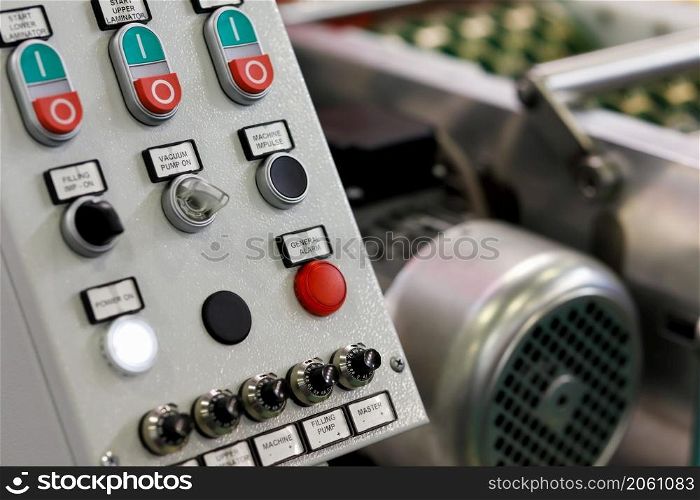 Industrial machine control panel close up. Selective focus.