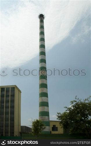 Industrial new colored chimney. Vertical image
