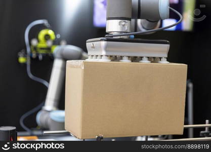 Industrial pick and place robotic or robot arm for cardboard box packing