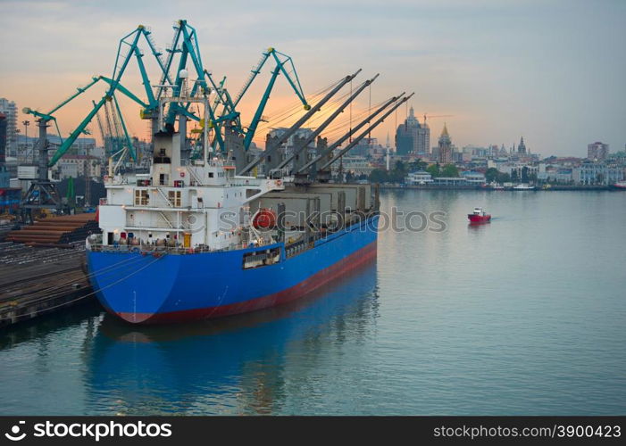 Industrial ship in Batumi port at dusk. Georgia
