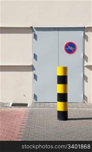 industrial warehouse with emergency exit door (parking vehicles is strictly forbidden)