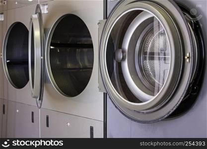 Industrial washing machines to clean clothes, details of cleaning and hygiene of clothes