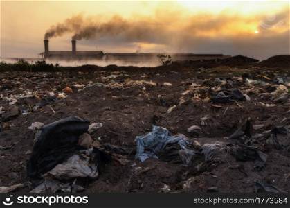 Industrial waste and air pollution with black smoke from chimneys. . industrial waste.