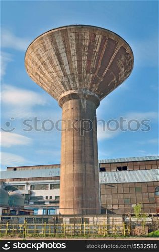 industrial water tower inside of plant