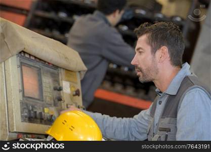 industrial worker at control monitor