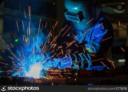 Industrial worker is welding repair his work in factory