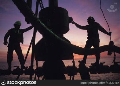 Industrial Workers on an Oil Rig