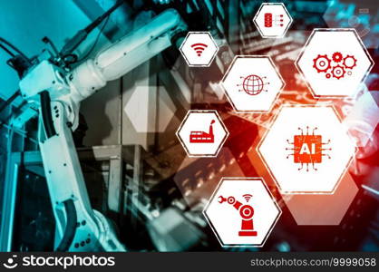Industry 4.0 technology concept - Smart factory for fourth industrial revolution with icon graphic showing automation system by using robots and automated machinery controlled via internet network .. Industry 4.0 technology concept - Smart factory for fourth industrial revolution