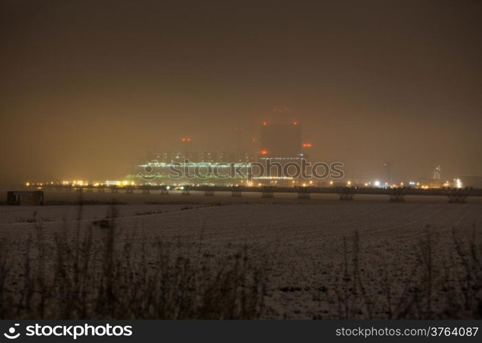 Industry and environment. Winter night scene of power station