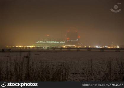 Industry and environment. Winter night scene of power station