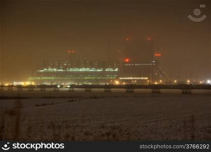 Industry and environment. Winter night scene of power station