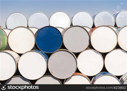 Industry oil chemical metal barrels stacked up in waste yard of tank and container, Kawasaki city near Tokyo Japan