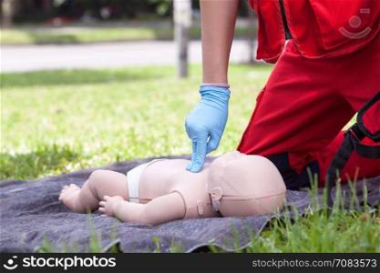 Infant CPR dummy first aid. Cardiac massage.