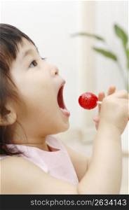 Infant who eats a candy
